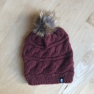 Women’s north face beanie with faux fur Pom Pom.